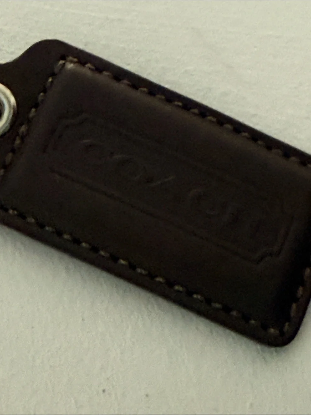 Coach brown leather hang tag fob 2.5”